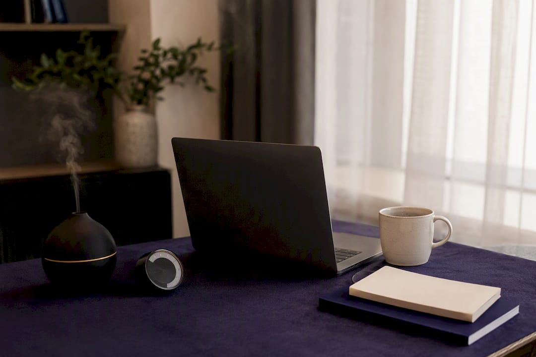 Trading desk corner set for mindfulness practice with diffuser